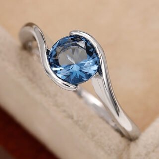 Fashion Twisted Arm Blue Round Diamond Zircon Topaz Simple Women's Ring